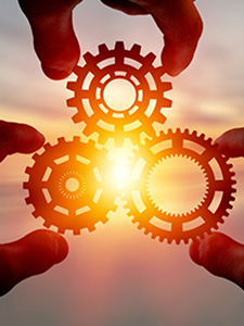 Bild Zahnräder greifen in einander